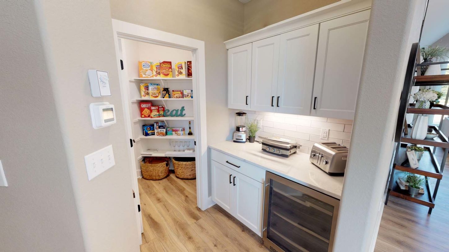 Demlang Builders - The Harper model home messy kitchen