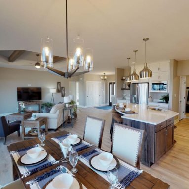 The Hadley model home dining room/kitchen/family room