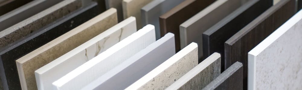 Supply-Chain-Problems-Demlang-Solutions-Blog Close up of stone kitchen countertop samples