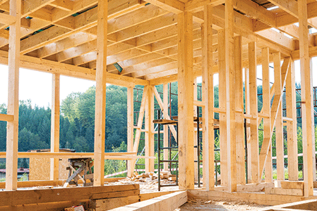 Interior frame of new wooden house under construction