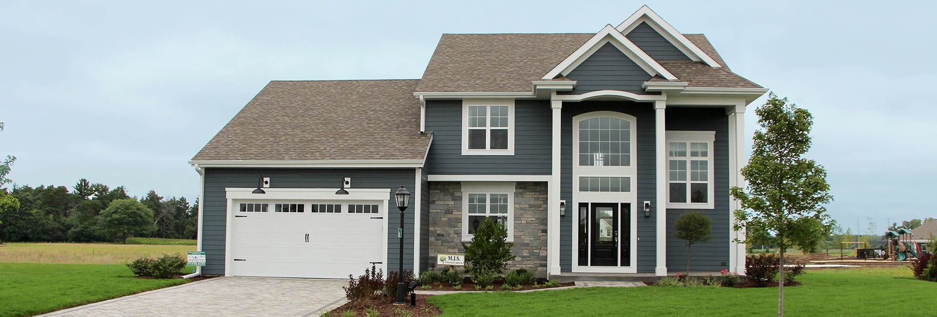 genevieve-front-elevation-header The Genevieve Front Exterior by Demlang Builders